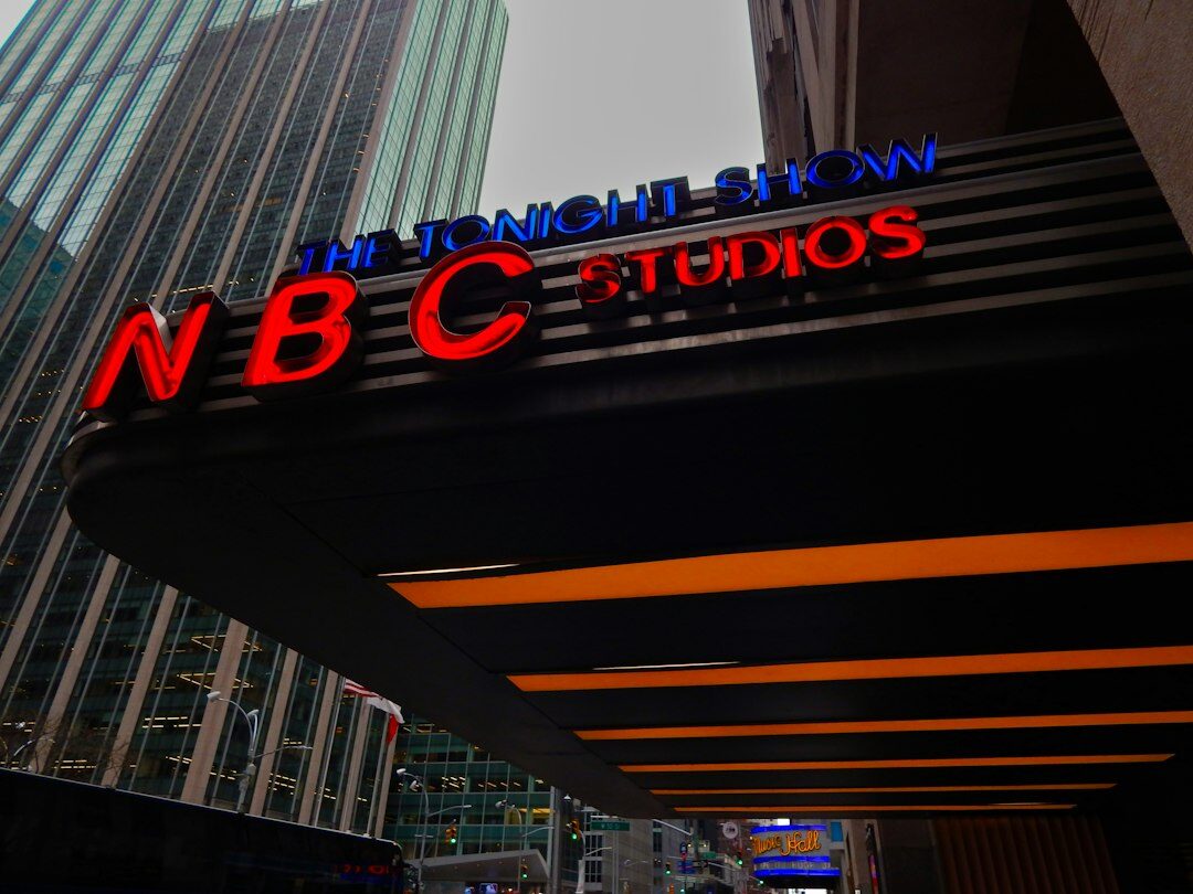 Illuminated ON AIR sign above a TV studio during live broadcast